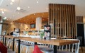 Bäckerei-Filiale Sipl in Ingolstadt. Große abgerundete Back-Theke. Gemütliche Sitzgelegenheiten Bäckerei-Filiale Sipl in Ingolstadt. Große abgerundete Back-Theke. Gemütliche Sitzgelegenheiten